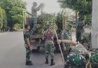 Personel Kodim 1402/Polman Gelar Kerja Bakti Bersihkan Lingkungan di Kelurahan Madatte